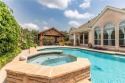 This home is nestled in the sought-after Woodbridge master for sale in Sachse Texas Collin County County on GolfHomes.com