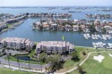 Enjoy year round sunsets from your large west facing balcony for sale in Gulfport Florida Pinellas County County on GolfHomes.com