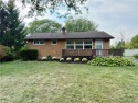 Welcome to this well-maintained 4-bedroom, 2-bath brick Ranch for sale in Lewiston New York Niagara County County on GolfHomes.com