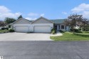 Welcome to easy living in the heart of Elk Rapids! This charming for sale in Elk Rapids Michigan Antrim County County on GolfHomes.com