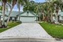 Coveted Woodridge Green villa in beautiful East Lake Woodlands! for sale in Oldsmar Florida Pinellas County County on GolfHomes.com