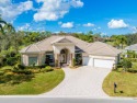 Lovely POOL home with WATERFRONT and GOLF COURSE view! With four for sale in Wellington Florida Palm Beach County County on GolfHomes.com
