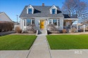 The well known White House with yellow door is completely for sale in Caldwell Idaho Canyon County County on GolfHomes.com