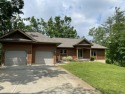 Spacious & comfortable Loon Lake golf course ranch with main for sale in Gaylord Michigan Otsego County County on GolfHomes.com