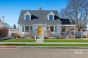 The well known White House with yellow door is completely for sale in Caldwell Idaho Canyon County County on GolfHomes.com