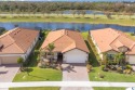 Must see NOW.  Pool home on Sarasota National's lake side. NO for sale in Venice Florida Sarasota County County on GolfHomes.com