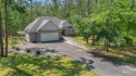 MICHAYWE GEM - As you enter through the impressive entrance the for sale in Gaylord Michigan Otsego County County on GolfHomes.com