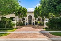 Exuding sophistication and timeless appeal, this stunning for sale in Wellington Florida Palm Beach County County on GolfHomes.com