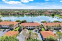 Welcome to this beautifully RENOVATED, LAKE-FRONT, first-floor for sale in Naples Florida Collier County County on GolfHomes.com