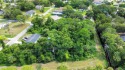 Nestled in the heart of New Smyrna Beach, this treed buildable for sale in New Smyrna Beach Florida Volusia County County on GolfHomes.com