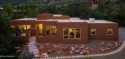 Exclusive Sun Up Ranch single level estate on an acre, designed for sale in Sedona Arizona Yavapai County County on GolfHomes.com