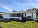 Stunning *PHILODENDRON* with private backyard, NO REAR NEIGHBORS for sale in Pinellas Park Florida Pinellas County County on GolfHomes.com