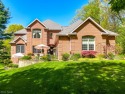 Discover your dream sanctuary nestled among the trees, just 7 for sale in Orrville Ohio Wayne County County on GolfHomes.com
