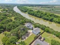 Exquisite luxury meets tranquil outdoors with this stunning home for sale in Granbury Texas Hood County County on GolfHomes.com
