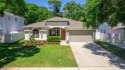 Welcome to this spacious, updated, 3 bedroom, plus a bonus room for sale in Palm Harbor Florida Pinellas County County on GolfHomes.com