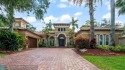 Experience luxury Parkland living in this custom-designed for sale in Parkland Florida Broward County County on GolfHomes.com