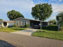 This meticulously maintained 1983 Barr 2bd 2ba home has been for sale in Lakeland Florida Polk County County on GolfHomes.com