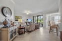 This first floor unit has a spectacular view looking down the for sale in Naples Florida Collier County County on GolfHomes.com