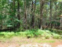 One of the few vacant lots left on White Deer Golf Course. Build for sale in Prudenville Michigan Roscommon County County on GolfHomes.com