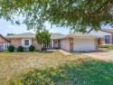 This well maintained three bedroom, two bath Home with Bonus for sale in Benbrook Texas Tarrant County County on GolfHomes.com