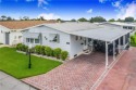 Welcome to effortless living in this charming 2-bedroom, 2-bath for sale in Haines City Florida Polk County County on GolfHomes.com