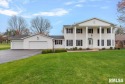 A stately find on the Jacksonville Country Club golf course.  A for sale in Jacksonville Illinois Morgan County County on GolfHomes.com