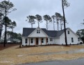 Lovely new ranch is being built on this stunning golf course lot for sale in Cape Carteret North Carolina Carteret County County on GolfHomes.com