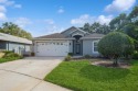 FABULOUS HOME ON GOLF COURSE ~ Move-In-Ready! This lovely for sale in Hudson Florida Pasco County County on GolfHomes.com