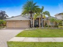 Welcome to this beautifully maintained 4-bedroom, 3-bathroom for sale in Melbourne Florida Brevard County County on GolfHomes.com