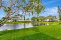 Beautifully appointed Corner unit  with Central AC is offered for sale in Boca Raton Florida Palm Beach County County on GolfHomes.com