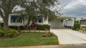 Rare opportunity to own a home with both a 2-car garage and a for sale in Palmetto Florida Manatee County County on GolfHomes.com