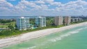 Set behind the gates of the prestigious Longboat Key Club, this for sale in Longboat Key Florida Sarasota County County on GolfHomes.com