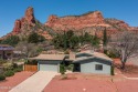 Charming single level home featuring floor-to-ceiling windows for sale in Sedona Arizona Yavapai County County on GolfHomes.com