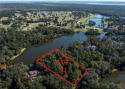 An astonishing 1.58 acre Lake front home site is located on for sale in Saint Simons Georgia Glynn County County on GolfHomes.com