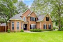 This stunning brick home offers a wonderful open floor plan with for sale in Rincon Georgia Effingham County County on GolfHomes.com