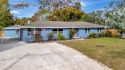 Welcome to this fully renovated 4-bedroom, 2-bathroom for sale in Bradenton Florida Manatee County County on GolfHomes.com