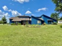 Just the facts, no fancy AI generated adjective heavy for sale in Chanute Kansas Neosho County County on GolfHomes.com