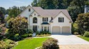 Welcome to this stunning brick entertainer's DREAM HOME in Towne for sale in Woodstock Georgia Cherokee County County on GolfHomes.com