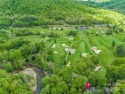 Captivating 3 BR, 2.5 BA Cape Cod home, ideally situated on the for sale in Burnsville North Carolina Yancey County County on GolfHomes.com