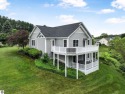Play 18 at The Crown, then cruise home in your golf cart to this for sale in Traverse City Michigan Grand Traverse County County on GolfHomes.com