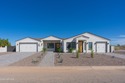 A truly exceptional custom-built residence, situated on a golf for sale in Arizona City Arizona Pinal County County on GolfHomes.com