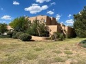 Timeless and elegant remodel with a gorgeous upstairs suite set for sale in Santa Fe New Mexico Santa Fe County County on GolfHomes.com