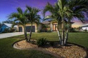 Discover serene luxury in this beautifully landscaped 2017 home for sale in Punta Gorda Florida Charlotte County County on GolfHomes.com