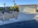 This great manufactured home is located in Palm Desert Greens for sale in Palm Desert California Riverside County County on GolfHomes.com
