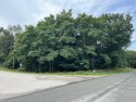 Looking to build your dream home? This beautiful .82 acre wooded for sale in Montague Michigan Muskegon County County on GolfHomes.com