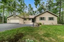 Enjoy sweeping golf course views and your own personal cart path for sale in Gaylord Michigan Otsego County County on GolfHomes.com