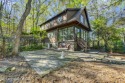 ''Hemlock Lodge'' is a charming 4-bedroom cottage filled with for sale in Buck Hill Falls Pennsylvania Monroe County County on GolfHomes.com