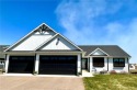 Would you love a Newly built home without the L O N G & Very for sale in River Falls Wisconsin Pierce County County on GolfHomes.com