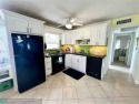 Welcome to this charming first-floor corner condo, lovingly for sale in Deerfield Beach Florida Broward County County on GolfHomes.com