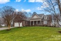 Anchoring a prominent corner lot in Woodbridge North, this for sale in Kings Mountain North Carolina Cleveland County County on GolfHomes.com